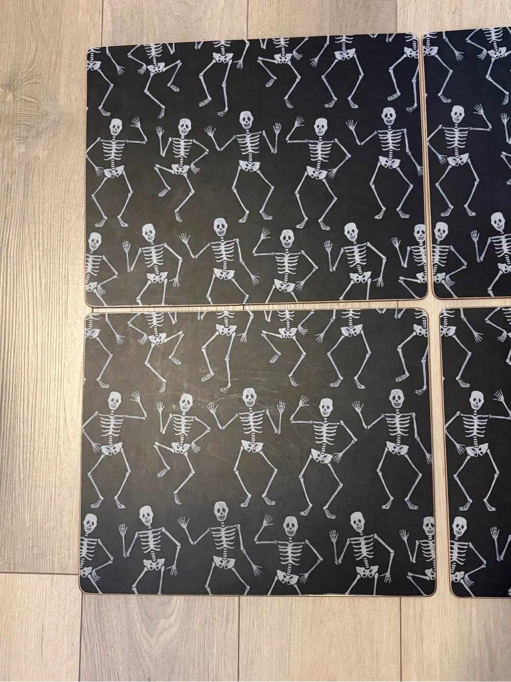 Williams Sonoma Spooky Dancing Skeletons Hardmat Placemat Halloween Set of 4
